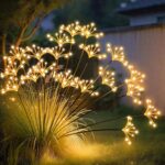 JJGoo Solar Garden Lights, New Upgraded 2 Pack Solar Swaying Starburst Light, Waterproof Fireworks Outdoor Lights, Yard Patio Pathway Decoration, Warm White - Image 2